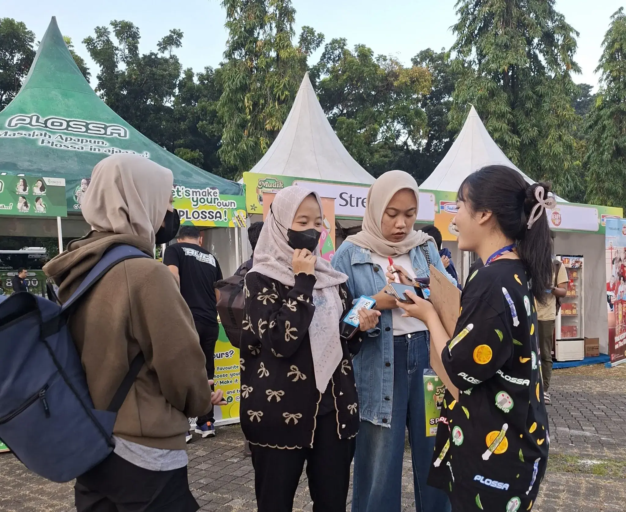 Promotion Banner of Plossa Supports Travelers' Comfort in “Mudik Bareng Indomaret” at East Parking Senayan